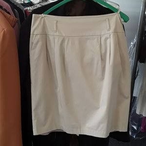 Causual, khaki colored, lined, skirt with pockets